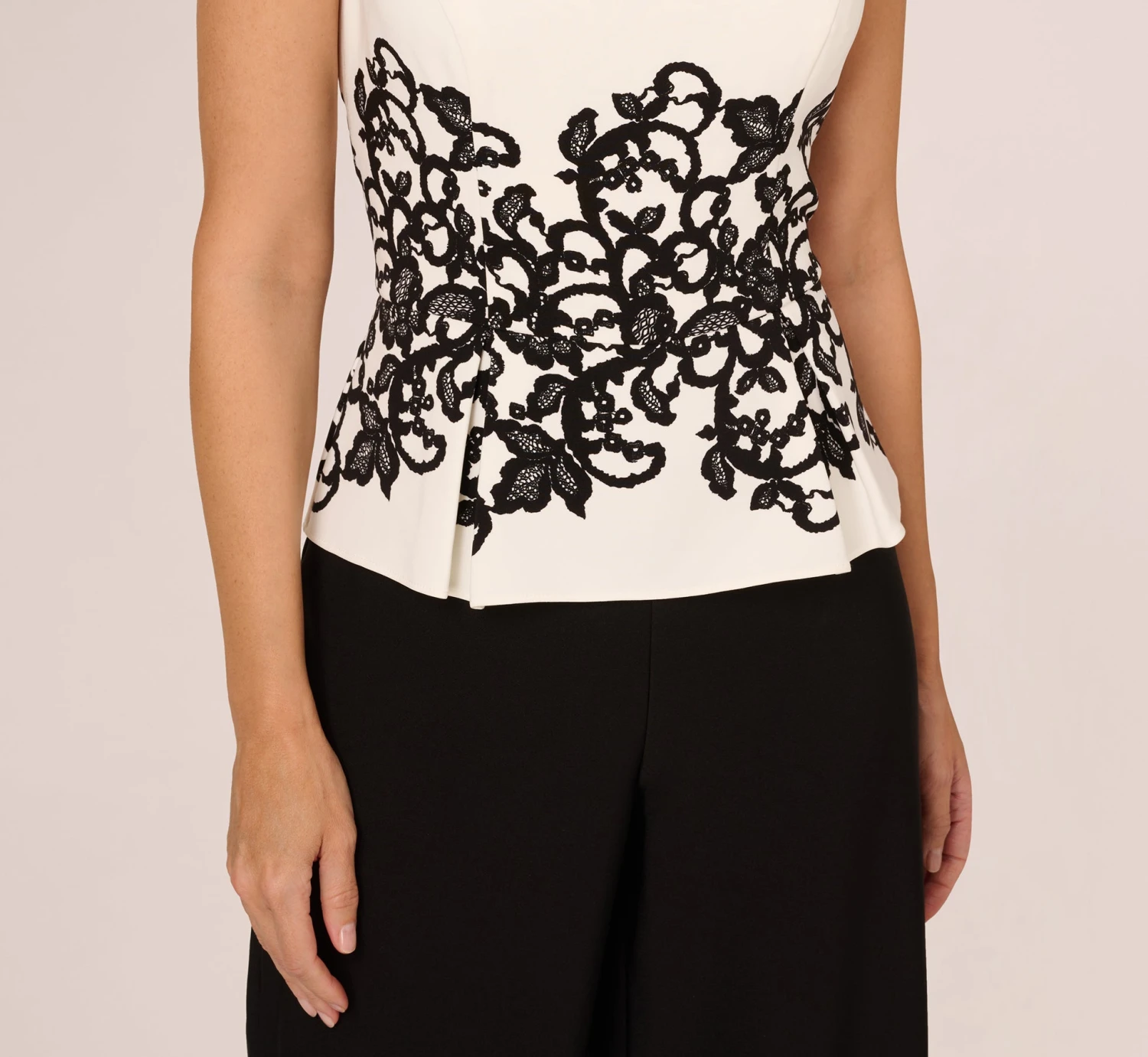 Adrianna Papell Sleeveless Peplum Jumpsuit With Scroll Lace Details In Ivory Black 3 Adrianna Papell Sleeveless Peplum Jumpsuit With Scroll Lace Details In Ivory Black - Image 3