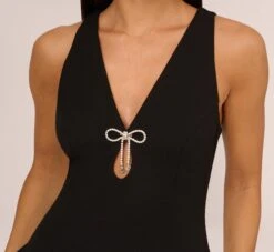 Sleeveless Crepe Mini Dress With Rhinestone Bow Accent In Black -Allure Attire MN1E208600 AA002 Regular Detail